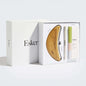 Body exfoliation tool set with wooden blade and slim oil sachet pack in box