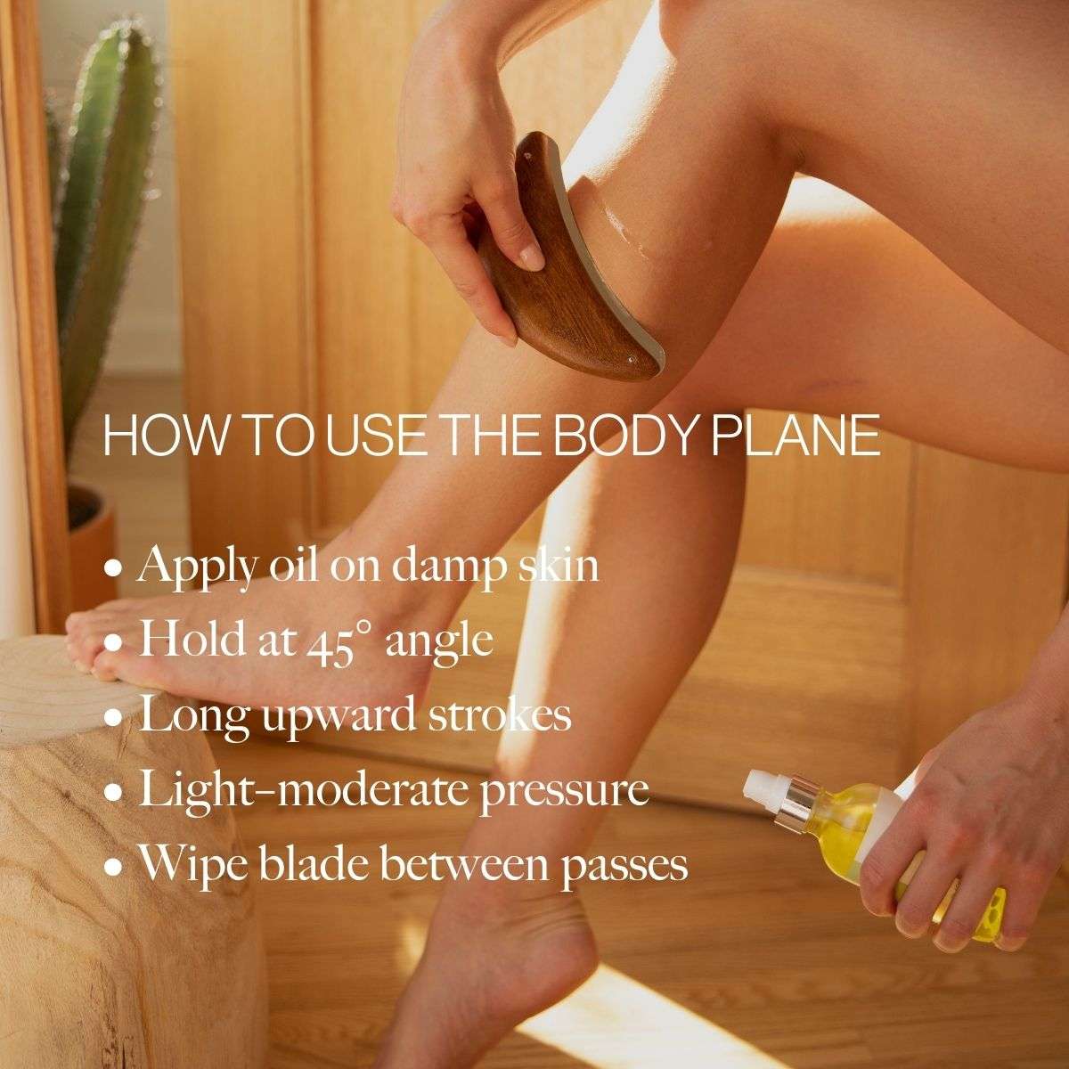Wooden body exfoliator blade tool used on damp skin at an angle