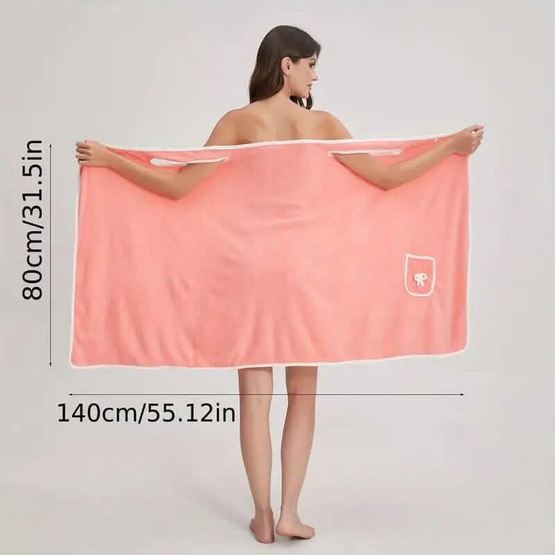 Pink wearable bath towel wrap/poncho with front pocket and white edge trim