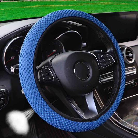Breathable mesh steering wheel cover in blue with textured grip and black inner edge
