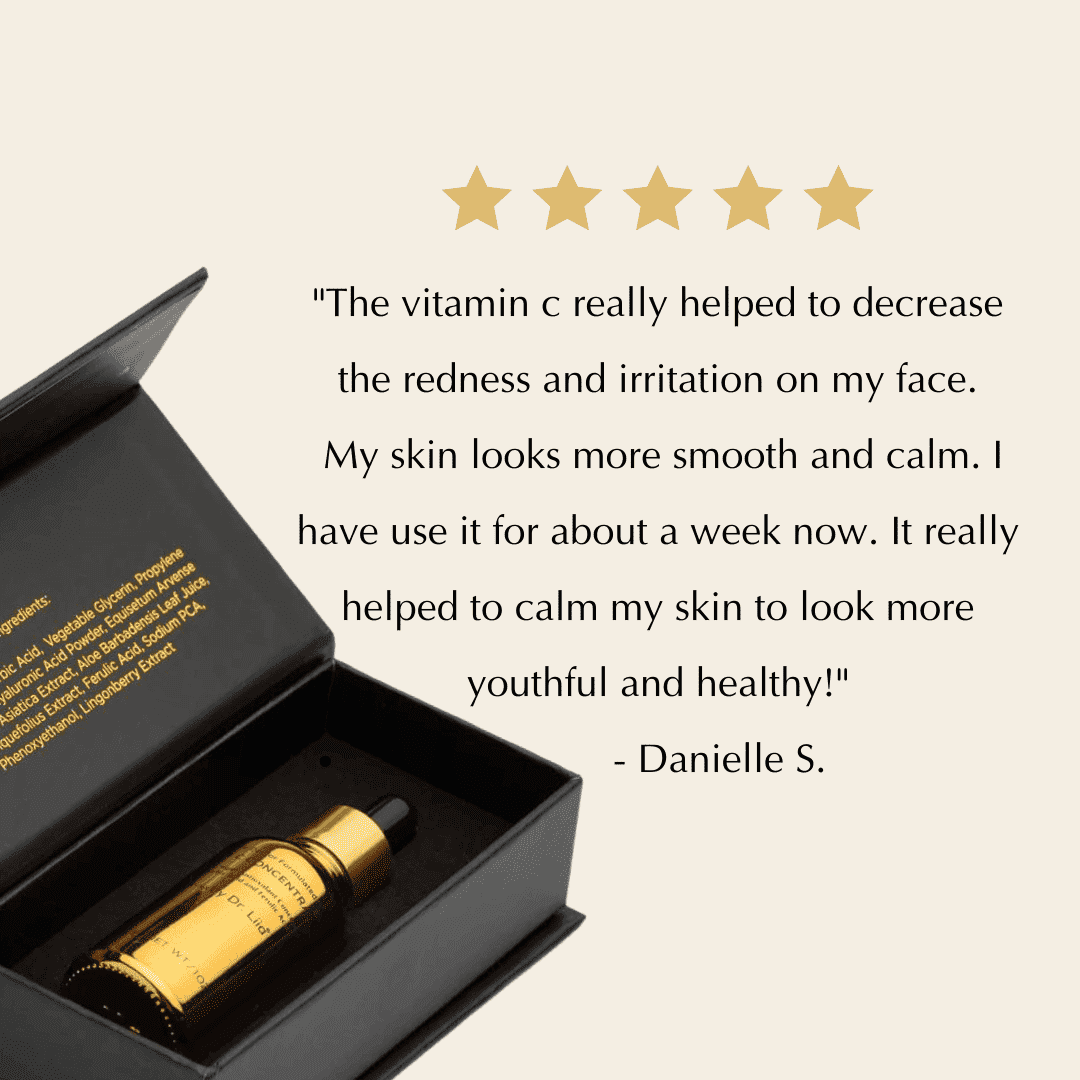 Serum bottle with dropper inside open black gift box