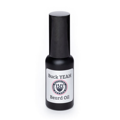 Beard oil bottle with Buck YEAH Beard Oil label and black cap