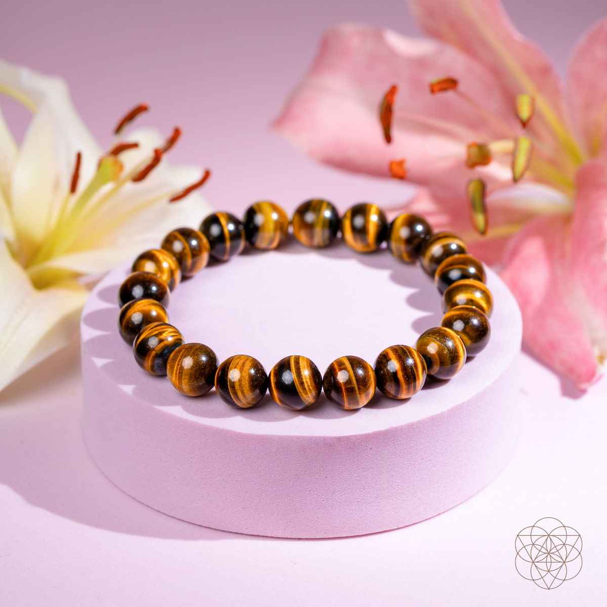 Tiger's eye bead bracelet with round amber-brown and dark striped beads, stretch.