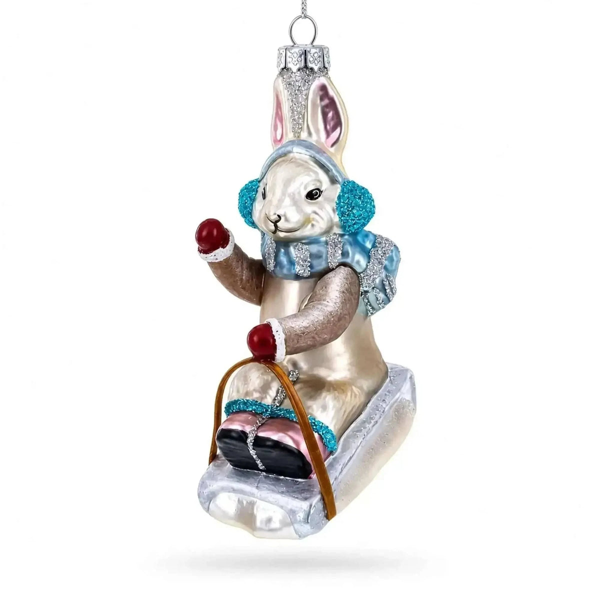 Bunny Sledding with Earmuffs Glass Christmas Ornament Cartsfy Inc.