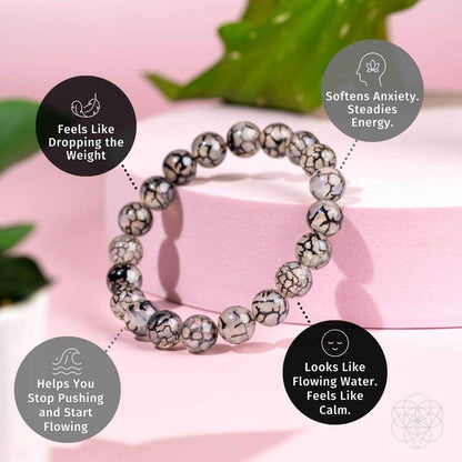 River agate beaded bracelet with gray-and-black marbled stones on light base