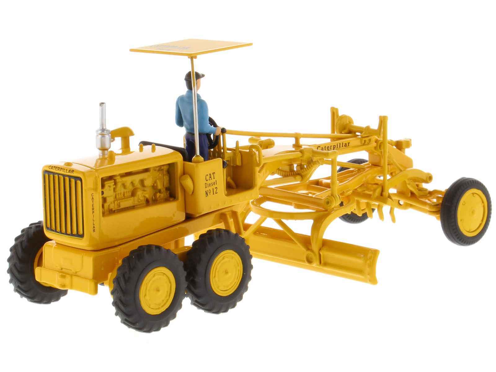 Yellow CAT motor grader diecast with seated operator, ribbed cab detail, grader blade