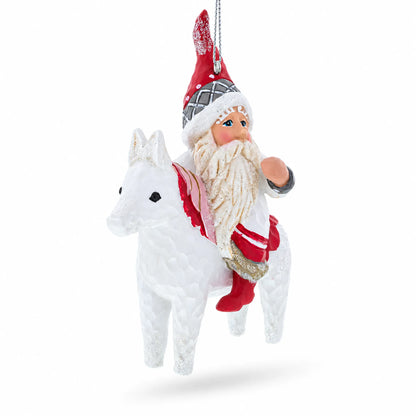 Santa Riding Horse Glass Christmas Ornament