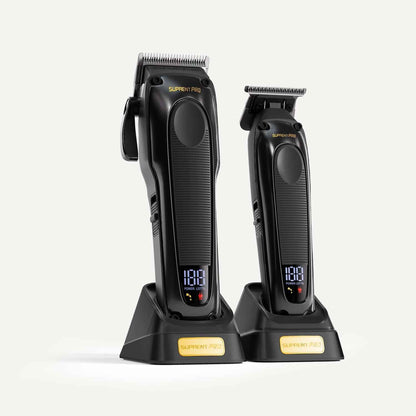 Two cordless hair clippers on charging docks with LED power indicators