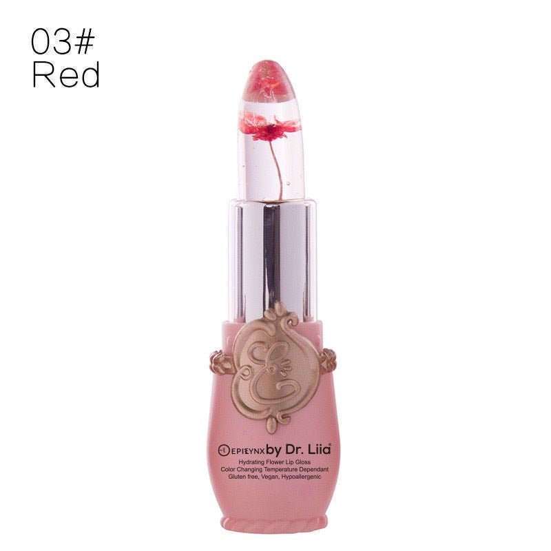 Red color-changing flower lip gloss in clear tube with pink base