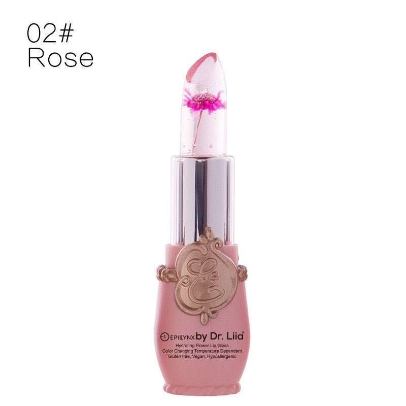 Color-changing flower lip gloss, rose shade tube with purple flower tip and pink base