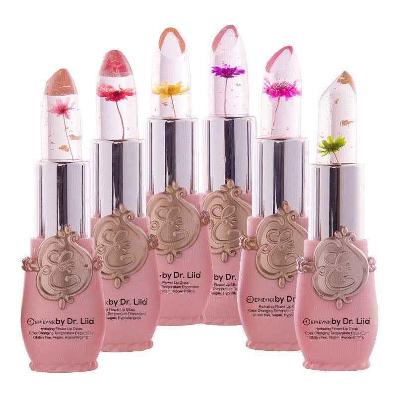 Set of color-changing flower lip glosses, multiple silver tubes with floral tips and pink