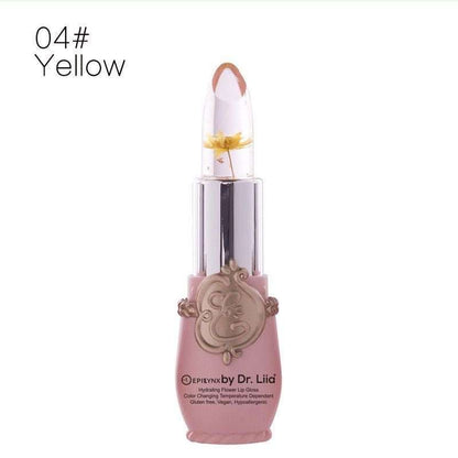 Yellow flower color-changing lip gloss in clear tube with pink base