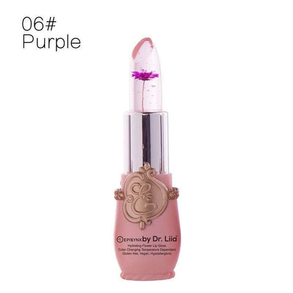 Purple flower color-changing lip gloss in clear tube with pink base