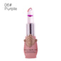Purple flower color-changing lip gloss in clear tube with pink base