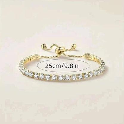 Gold-tone tennis bracelet with clear stones, 25cm/9.8in length mark