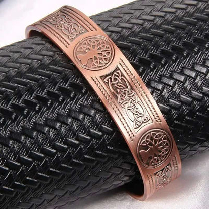 Copper magnetic bracelet cuff with engraved center band and three oval magnetic dots