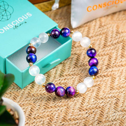 Purple and white gemstone bead bracelet on turquoise gift box, round beads