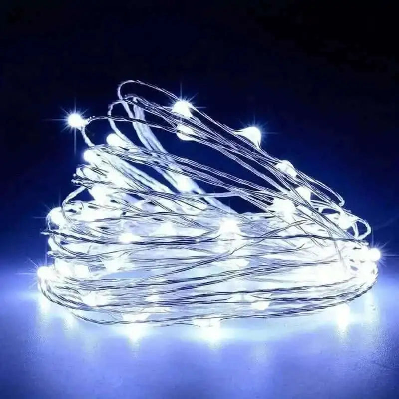 Cool white LED string lights with silver-toned wire, bundled coil.