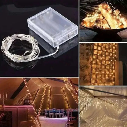 Warm white LED string lights with clear battery box, hanging strands.