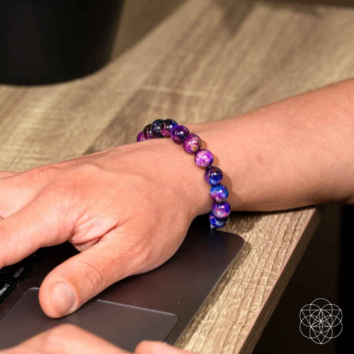 Purple and blue gemstone bead bracelet with round Tiger’s Eye-style beads