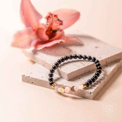 Shungite supercharged bracelet with black beads and pale pink stone accents