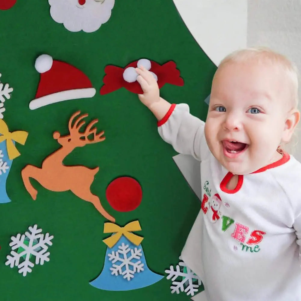 Green felt Christmas tree ornaments with reindeer, candy-cane pieces, and a child