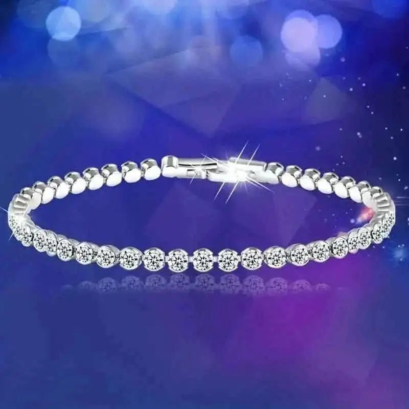 Silver-tone rhinestone tennis bracelet with round stones and link-style band