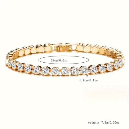 Gold-tone rhinestone tennis bracelet, 17cm length, box clasp, round stones