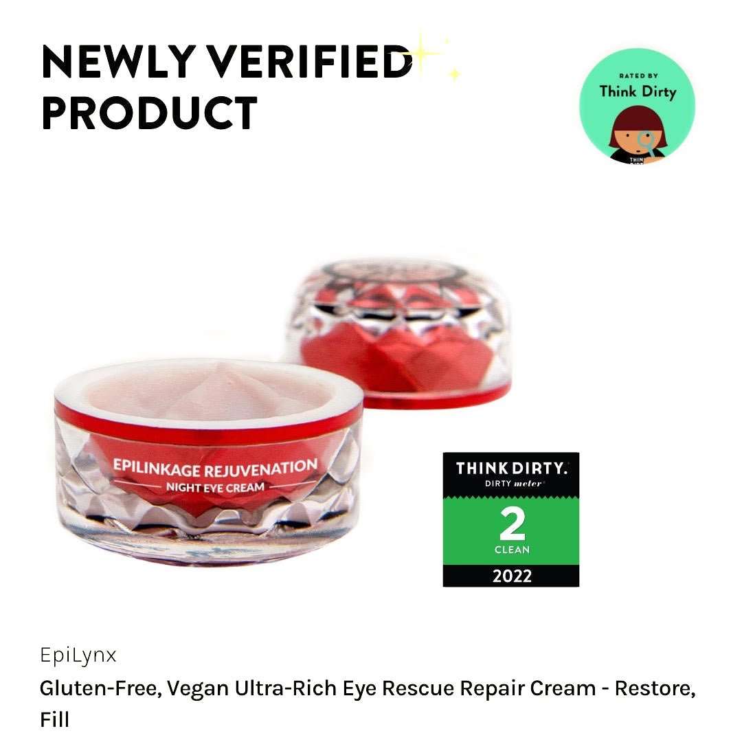 Eye cream jars with red-lidded containers in clear plastic pots