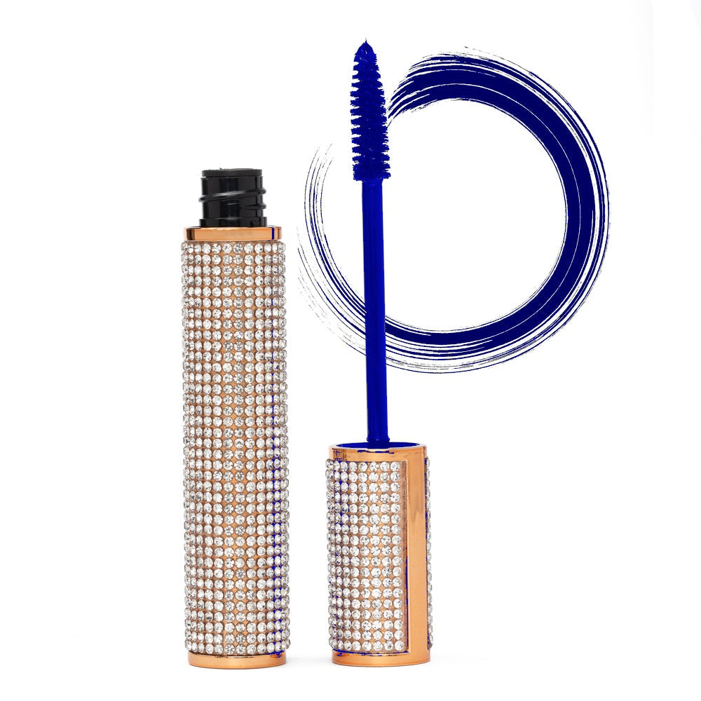 Blue mascara applicator and rhinestone tube with gold cap, blue lash swirl
