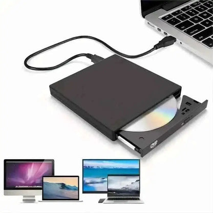 Portable black CD/DVD drive connected to laptop via USB cable, disc tray open