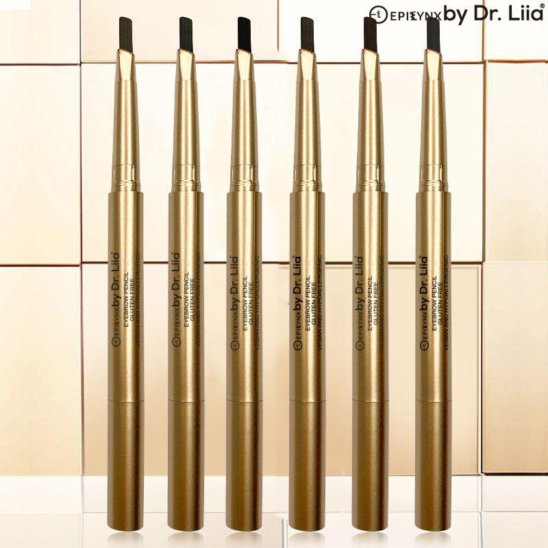 Set of gold eyebrow pencils with brush tips in multiple shades