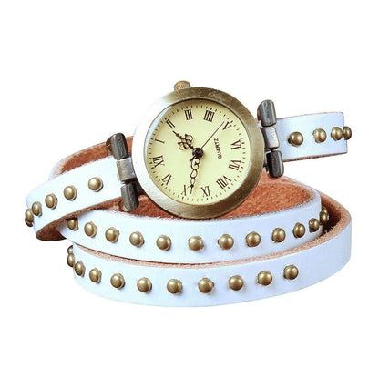 Retro leather belt watch with cream dial, white studded leather strap and bronze details.