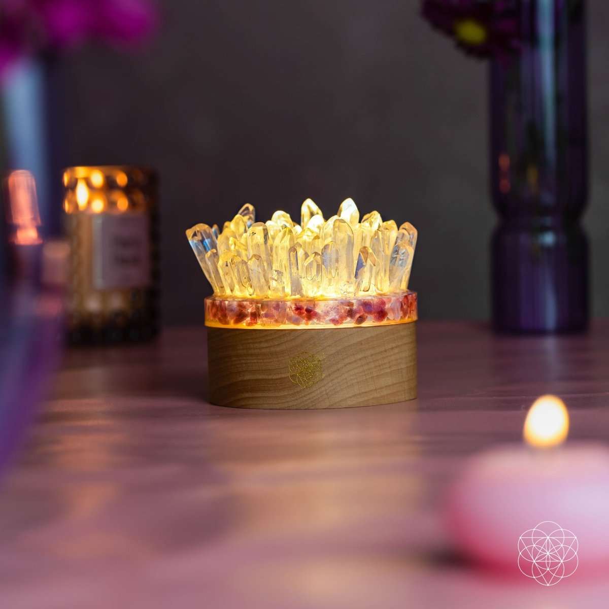 Quartz and tourmaline crystal lamp centerpiece with glowing clear crystal top and wood base