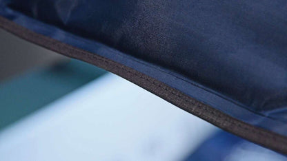 Gel ice pack fabric edge detail with stitched border and dark blue underside