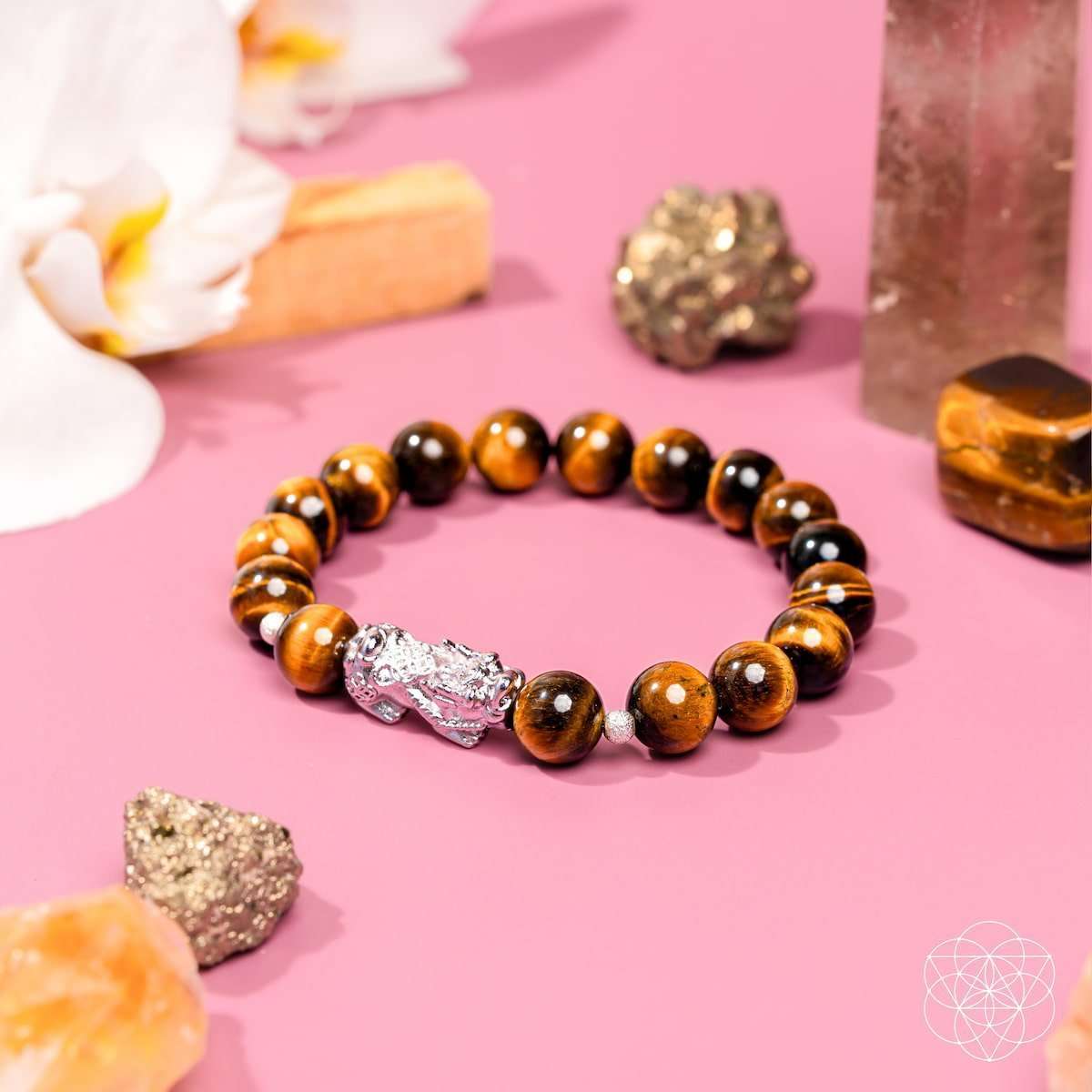 Tiger’s eye bead bracelet with silver Pixiu charm and polished dark-amber beads