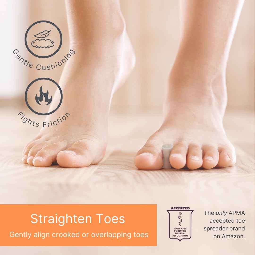 Pair of white gel toe separators cushioning between toes