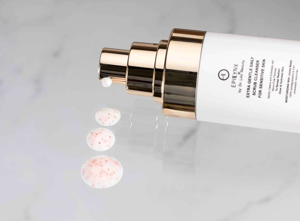 EpiLynx gentle exfoliating face scrub bottle with gold pump and white label