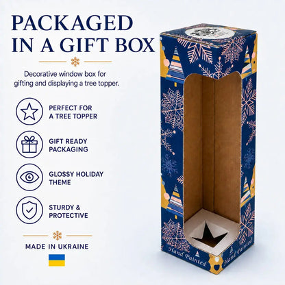 Gift-boxed Christmas tree topper in a blue decorative box with protective window