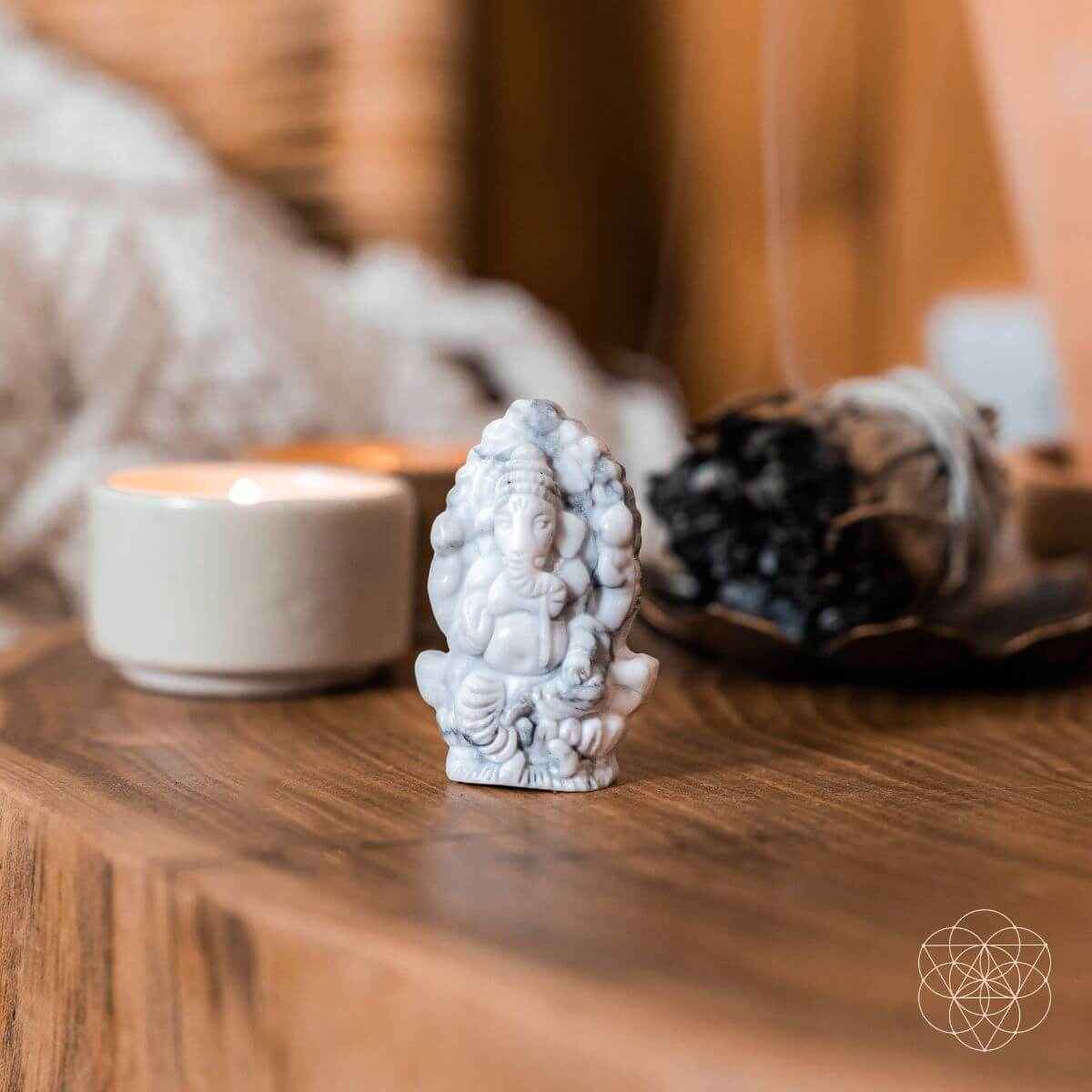 White howlite crystal Ganesh statue figure with textured carved details