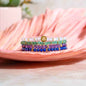 Four-piece beaded luck bracelet set with gold charm, purple, blue, green and white