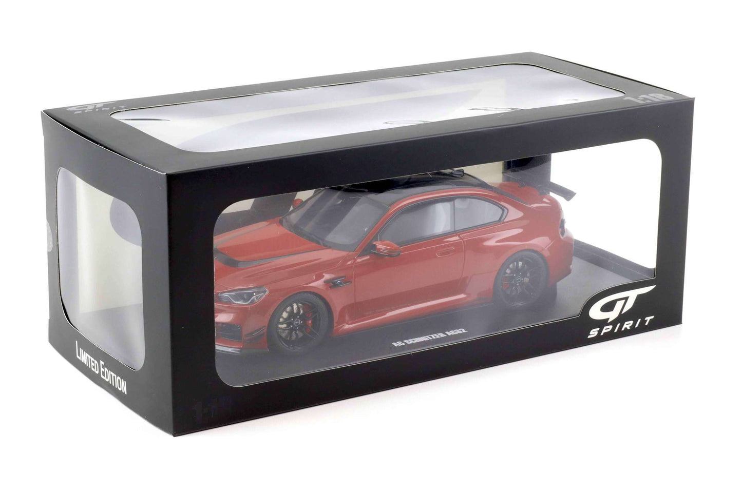 Die-cast car model in a display box with clear window and GT Spirit logo