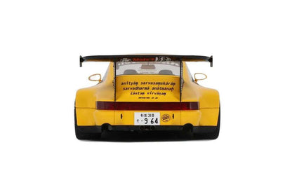 Yellow 1:18 scale Porsche 911 RWB diecast rear view with black diffuser and wing