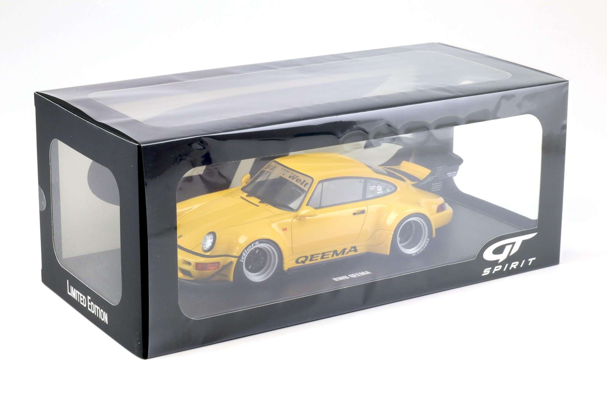 Yellow 1:18 scale Porsche 911 RWB diecast inside a display box with GT Spirit branding
