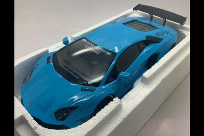Baby blue die-cast sports car model on a white foam display tray
