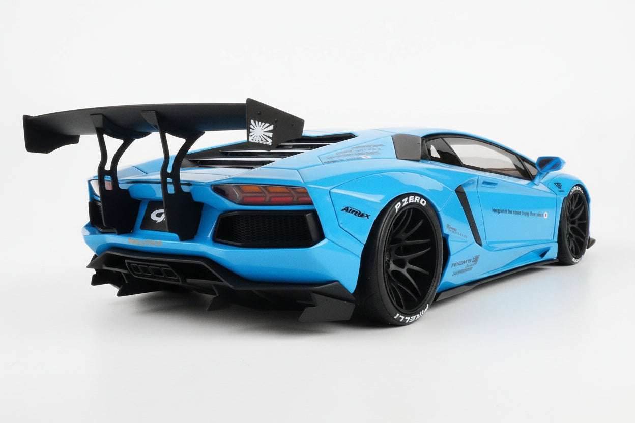 Baby blue die-cast sports car model rear 3/4 view with aggressive diffuser