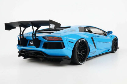 Baby blue die-cast sports car model rear 3/4 view with aggressive diffuser