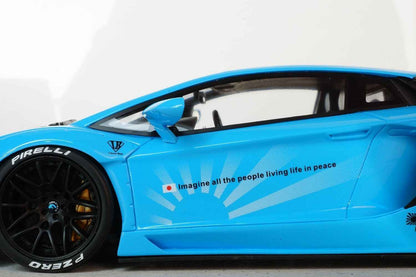 Baby blue die-cast sports car model, side door and front wheel close-up