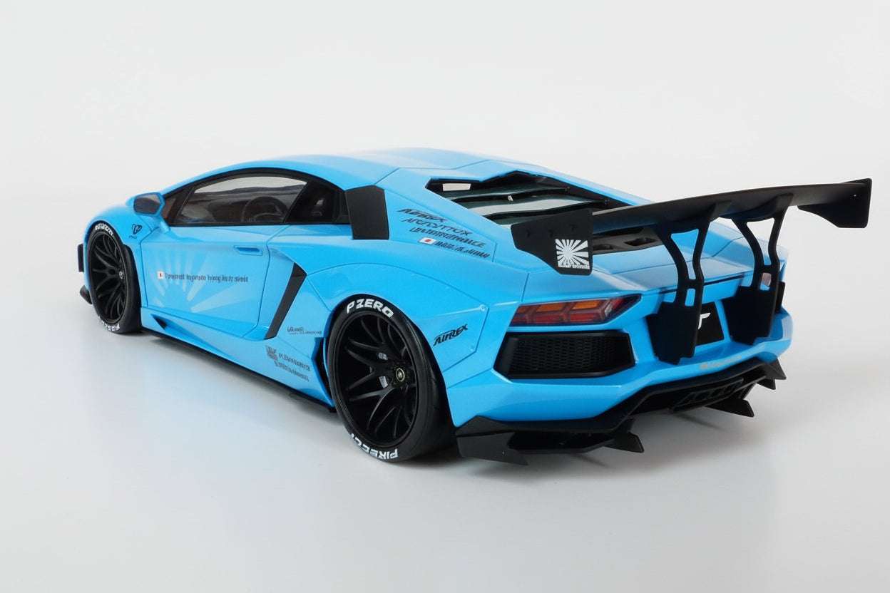 Baby blue die-cast sports car model rear 3/4 view with large wing