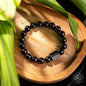 Black obsidian beaded bracelet with dark rectangular stone centerpiece